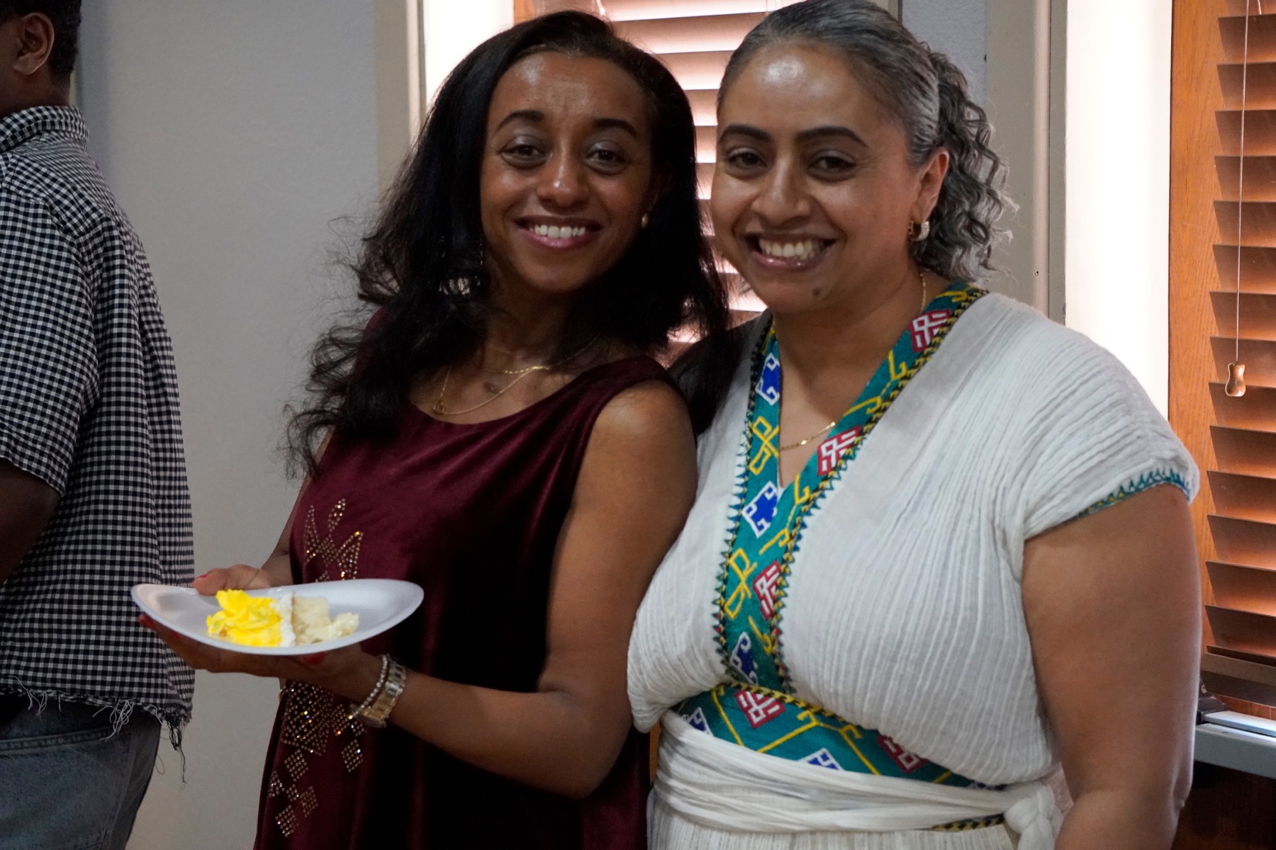 Women smiling during a church gathering