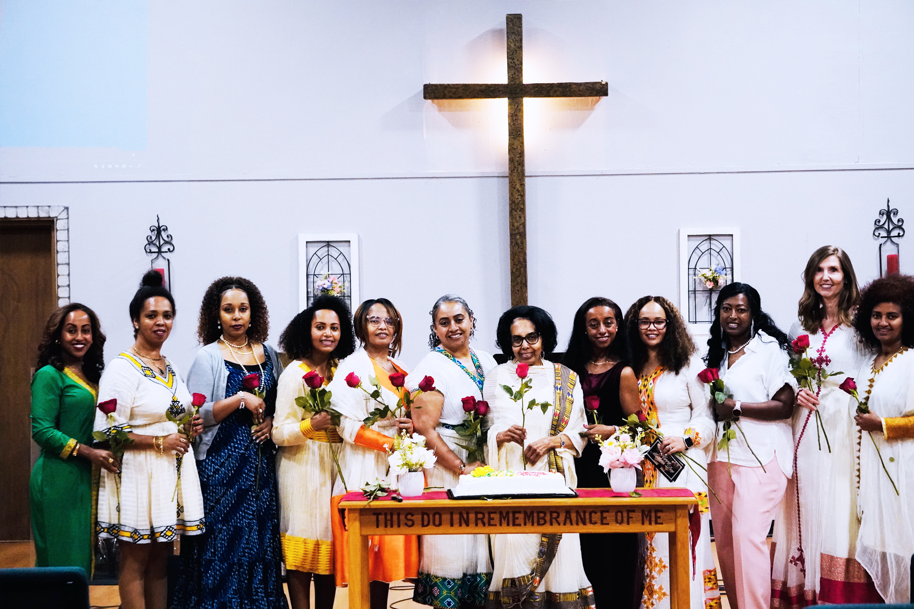Youth gathered in prayer at the altar
